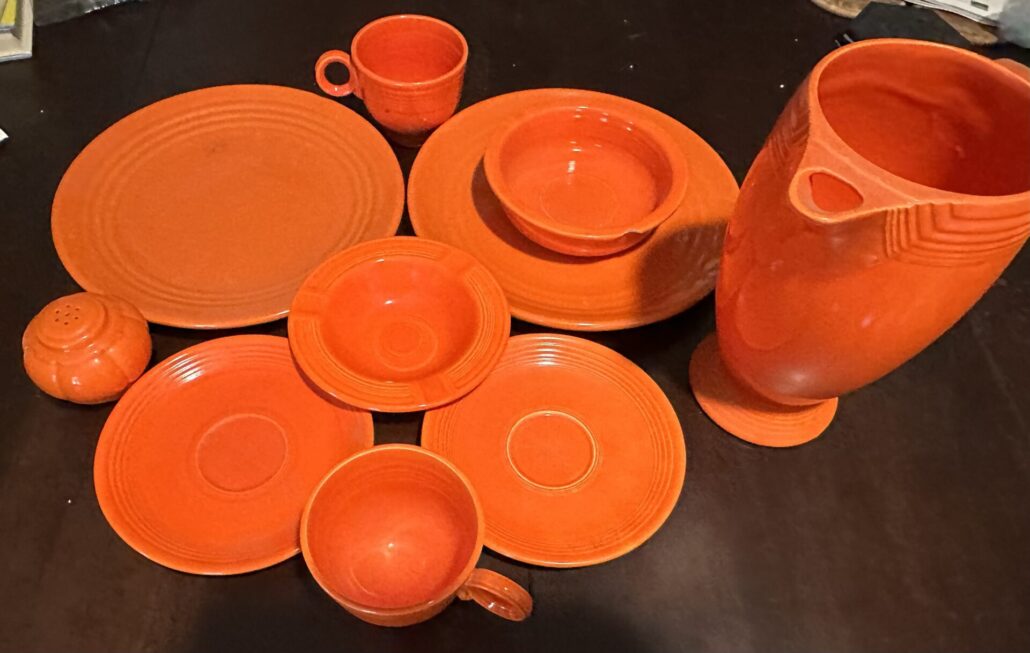 A whole bunch or red-orange glazed ceramics