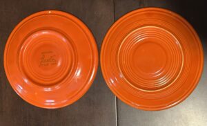 red-orange ceramic plates